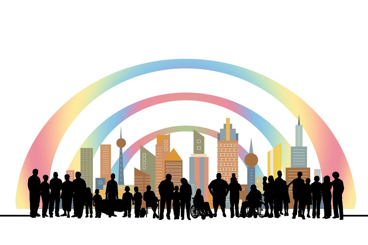 Diverse cartoon people colored black with a colorful city in the back and with three rainbows.